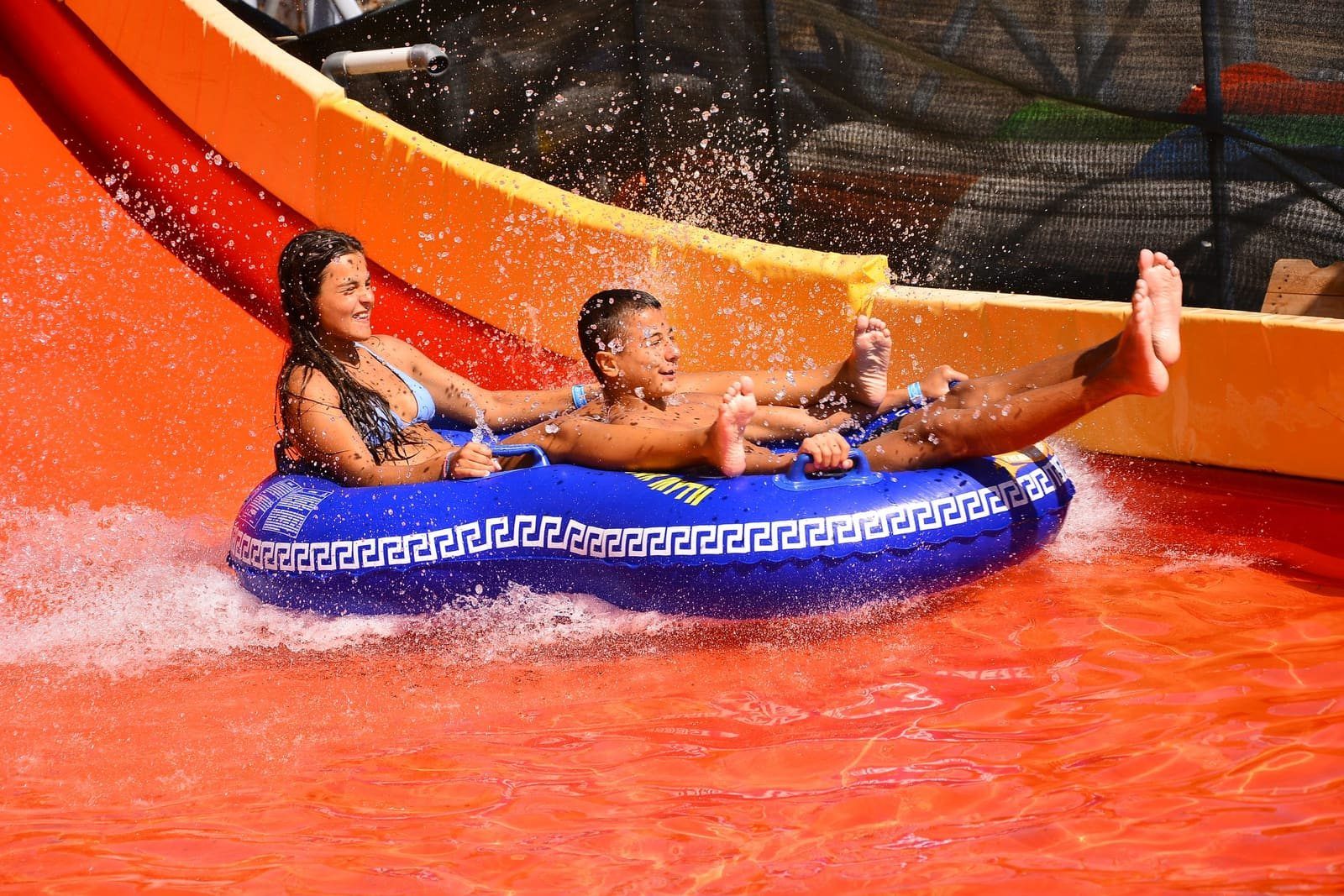 Guests on an orange slide