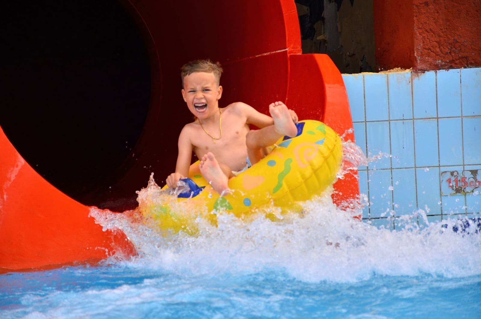 A boy on a yellow ring